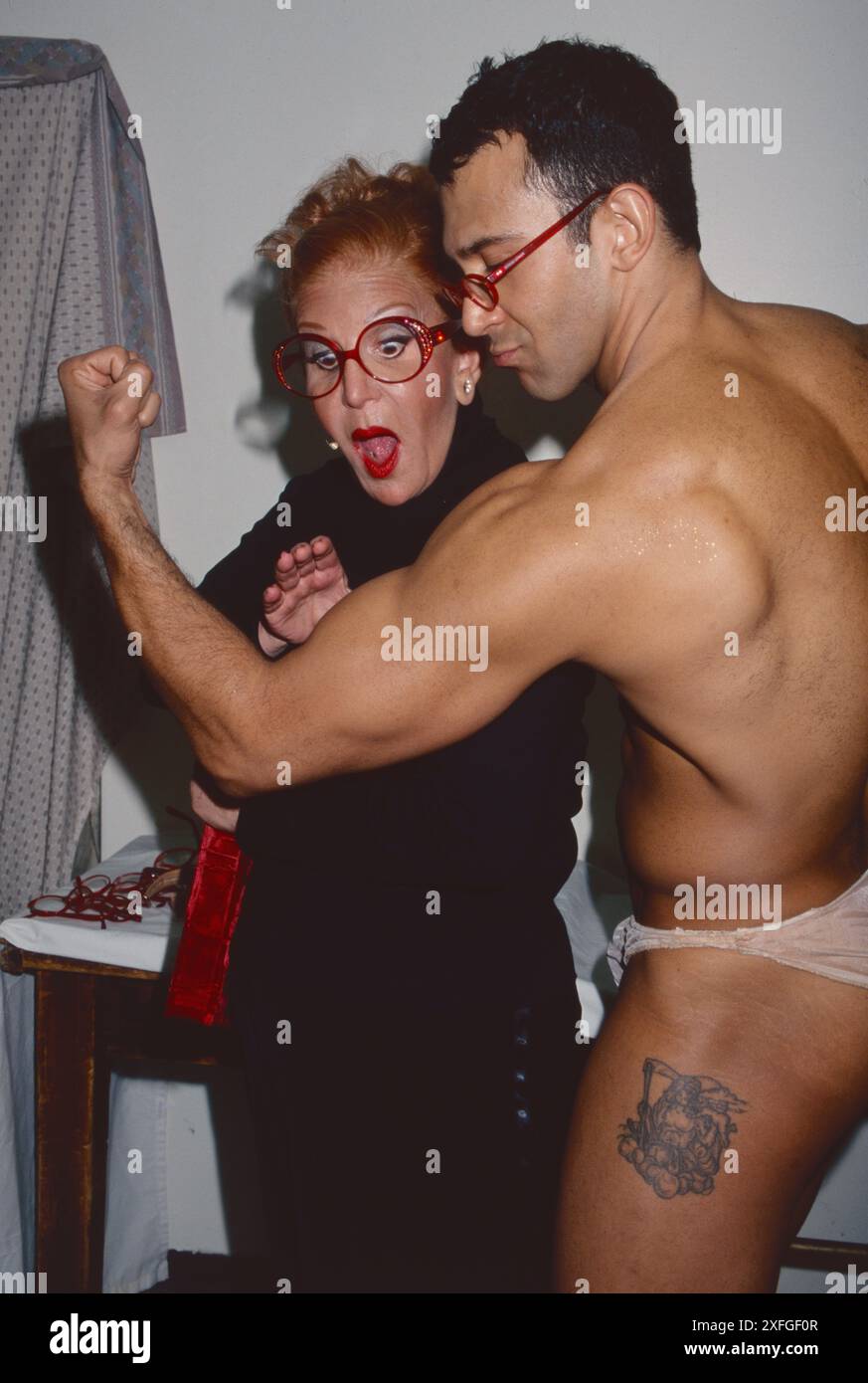 Sally Jessy Raphael makes her Broadway debut as the Narrator in 'The Rocky Horror Show' posing with Sebastian LaCause as Rocky at Circle in the Square Theatre in New York City on December 11, 2001.  Photo Credit: Henry McGee/MediaPunch Stock Photo