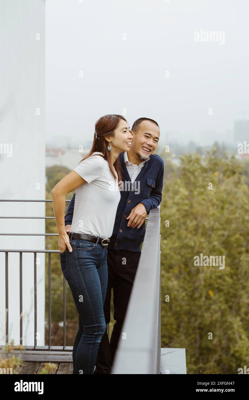 Indian standing in balcony hi-res stock photography and images - Alamy