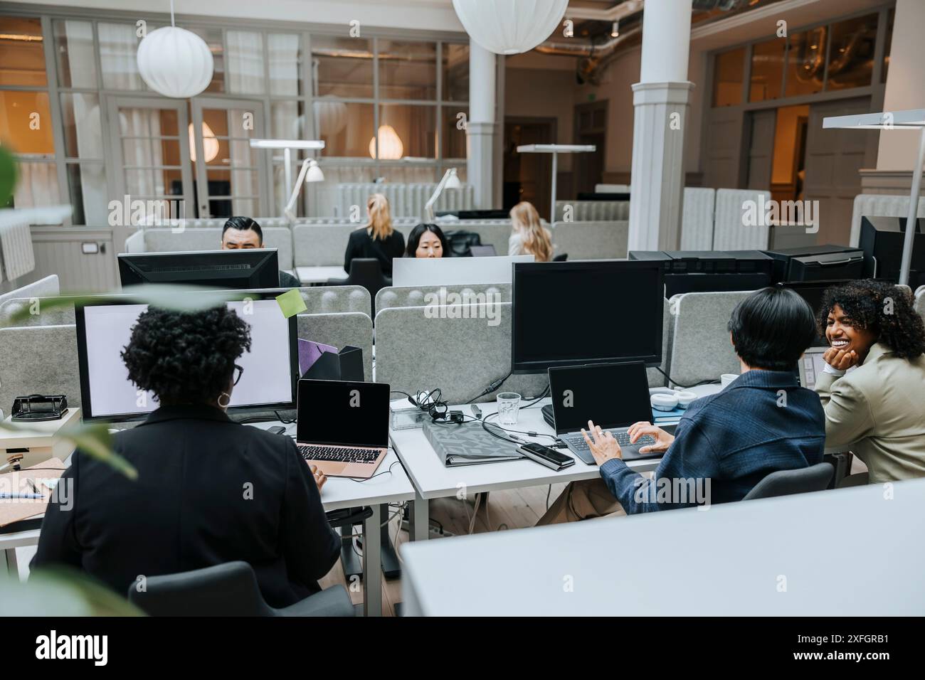 Office multiracial laptop monitor hi-res stock photography and images ...