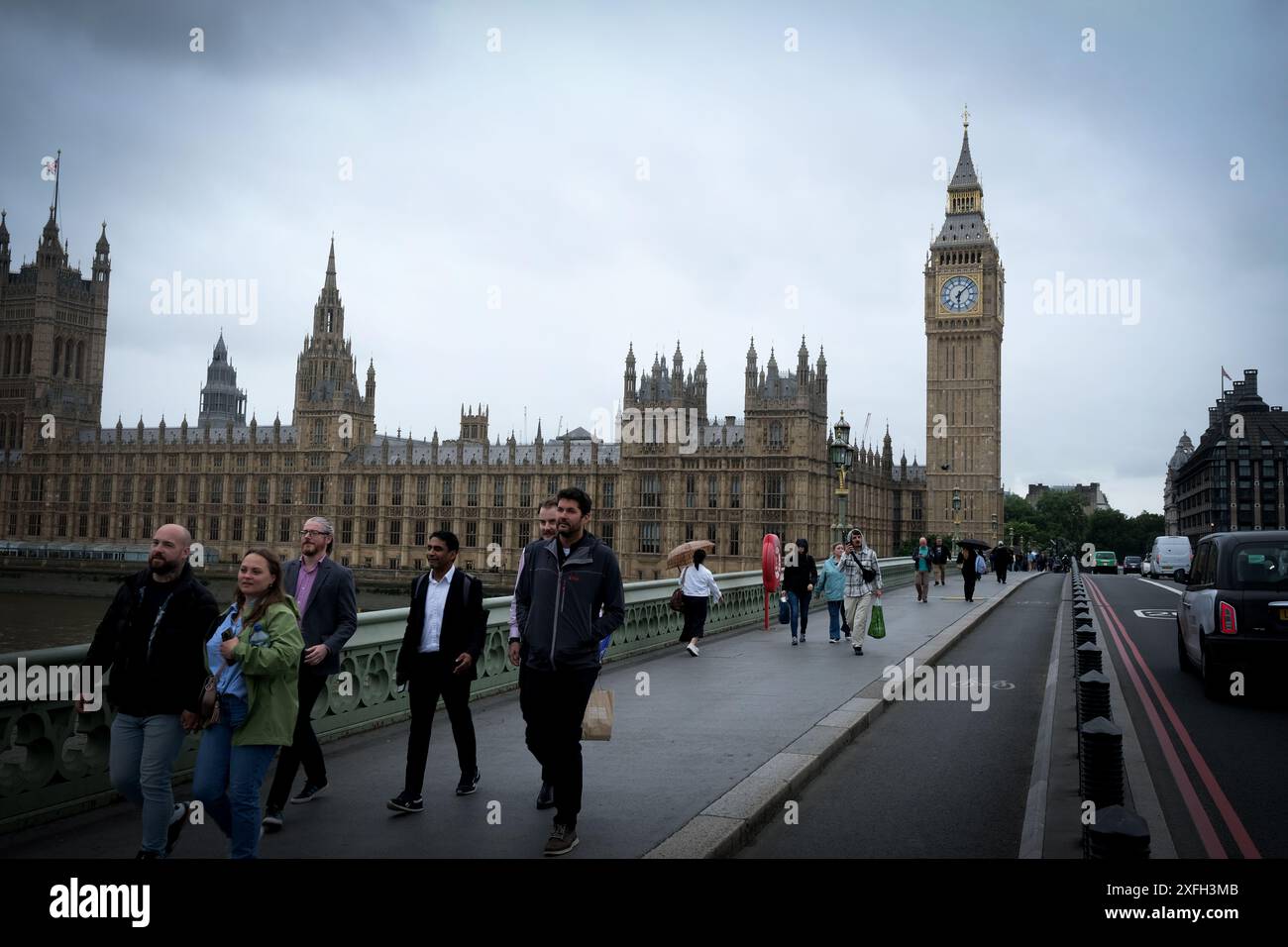 London, United Kingdom. 3rd July, 2024.  People walk with umbrellas in central London.   Laura Gaggero/Alamy Live News Stock Photo