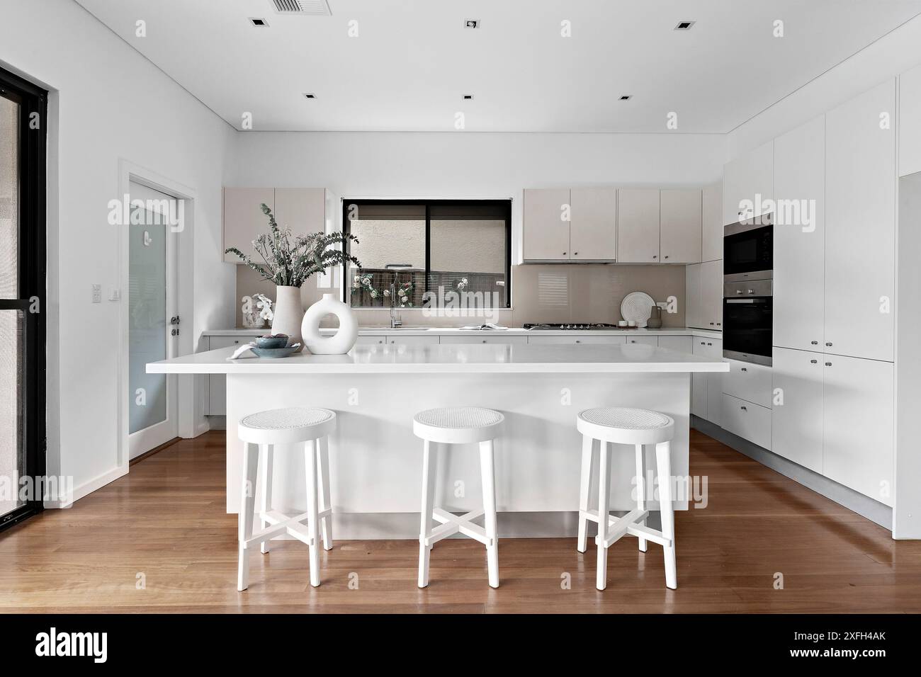 Modern kitchen bar stools hi-res stock photography and images - Alamy