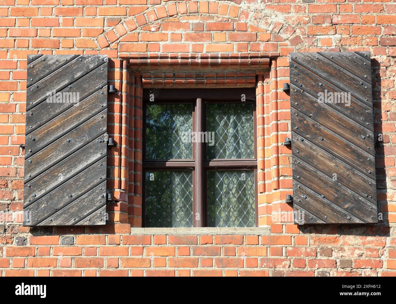 The close view of a window of 15th century merchant house, the oldest ...