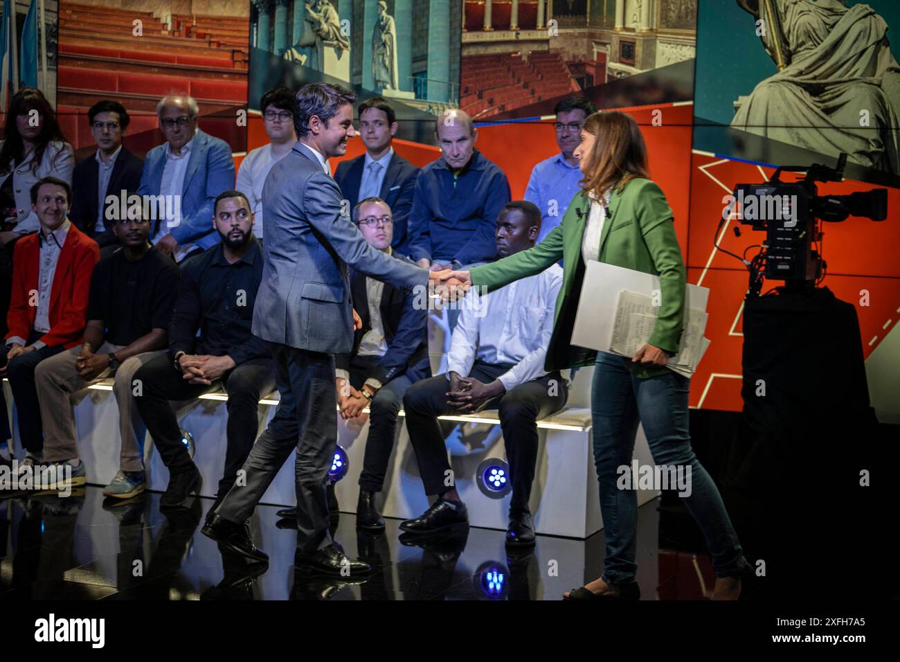 French Prime Minister Gabriel Attal shakes hand with Marine Tondelier