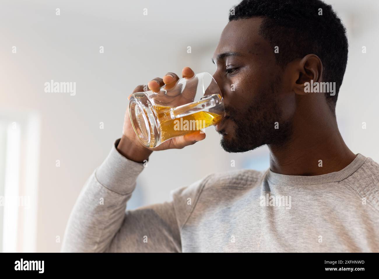 Man drinking breakfast juice hi-res stock photography and images - Alamy