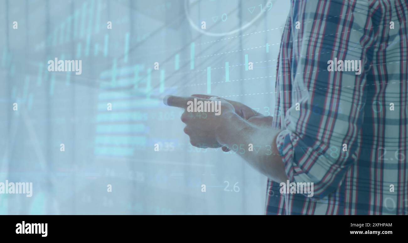 Image of multiple graphs, trading board, loading circles, caucasian man using cellphone Stock Photo