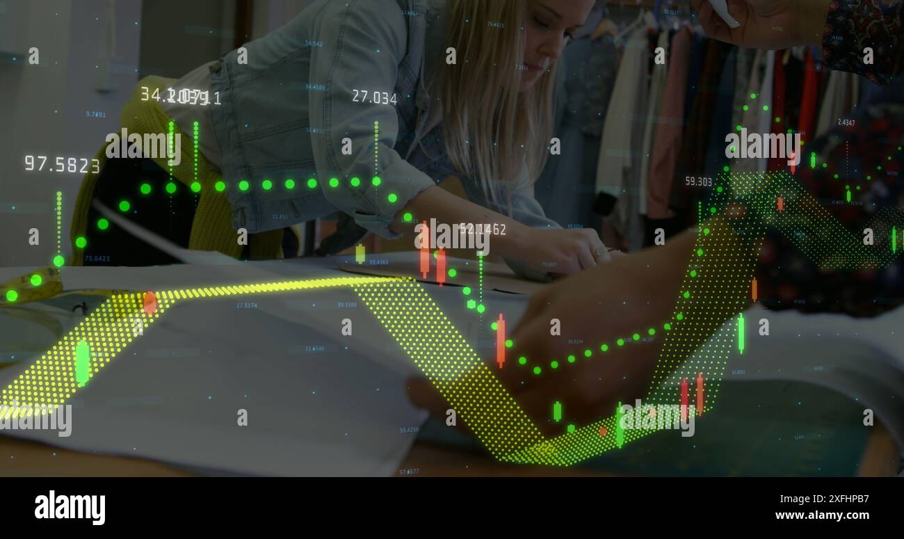 Image of graphs with numbers over caucasian designer drawing outline on cloth Stock Photo