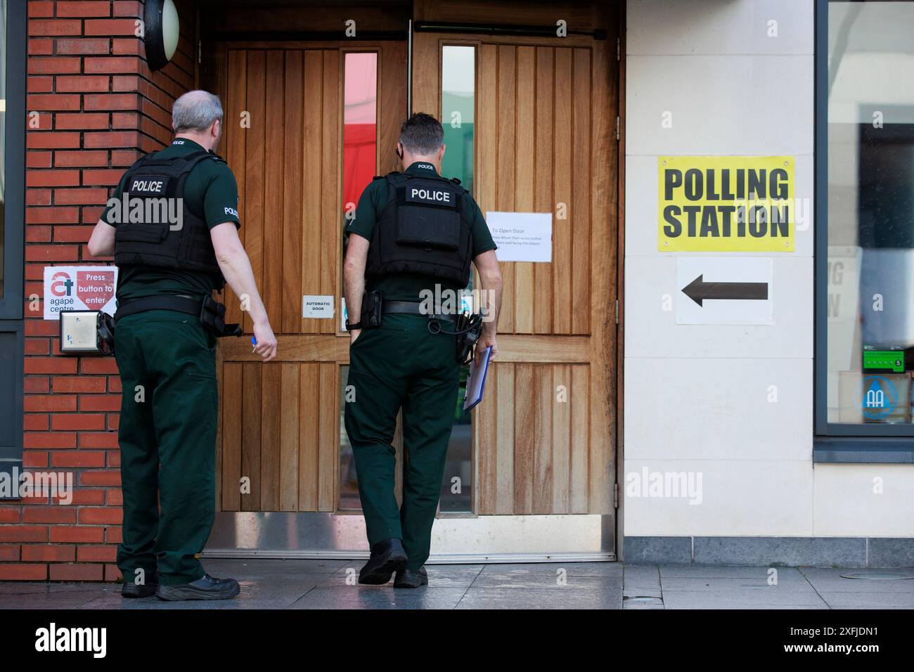 Police officers at Agape Centre polling station in south Belfast after ...