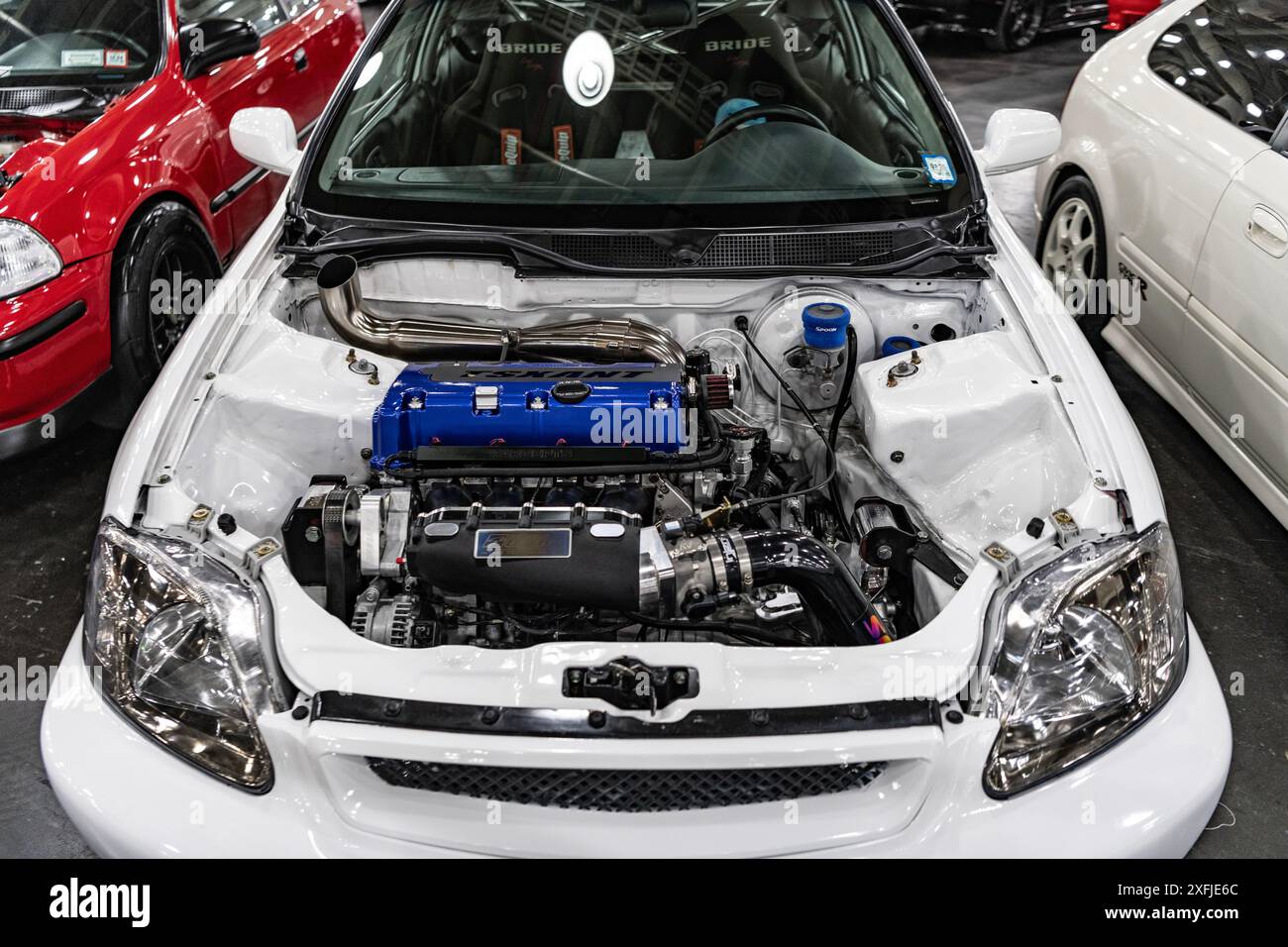 New York City, USA - March 27, 2024: Honda K engine in car with open ...