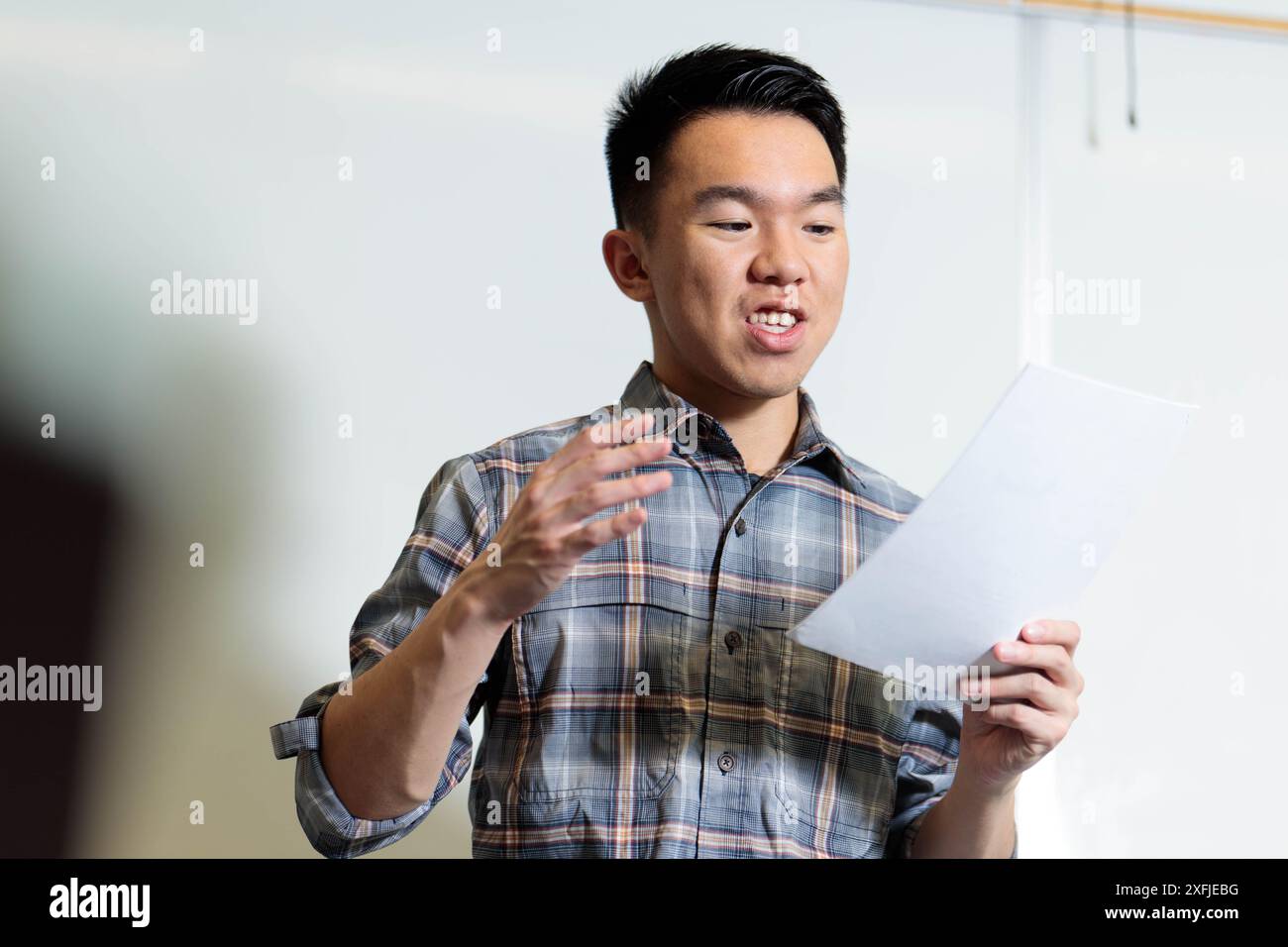 Student speaking in front of class hi-res stock photography and images ...