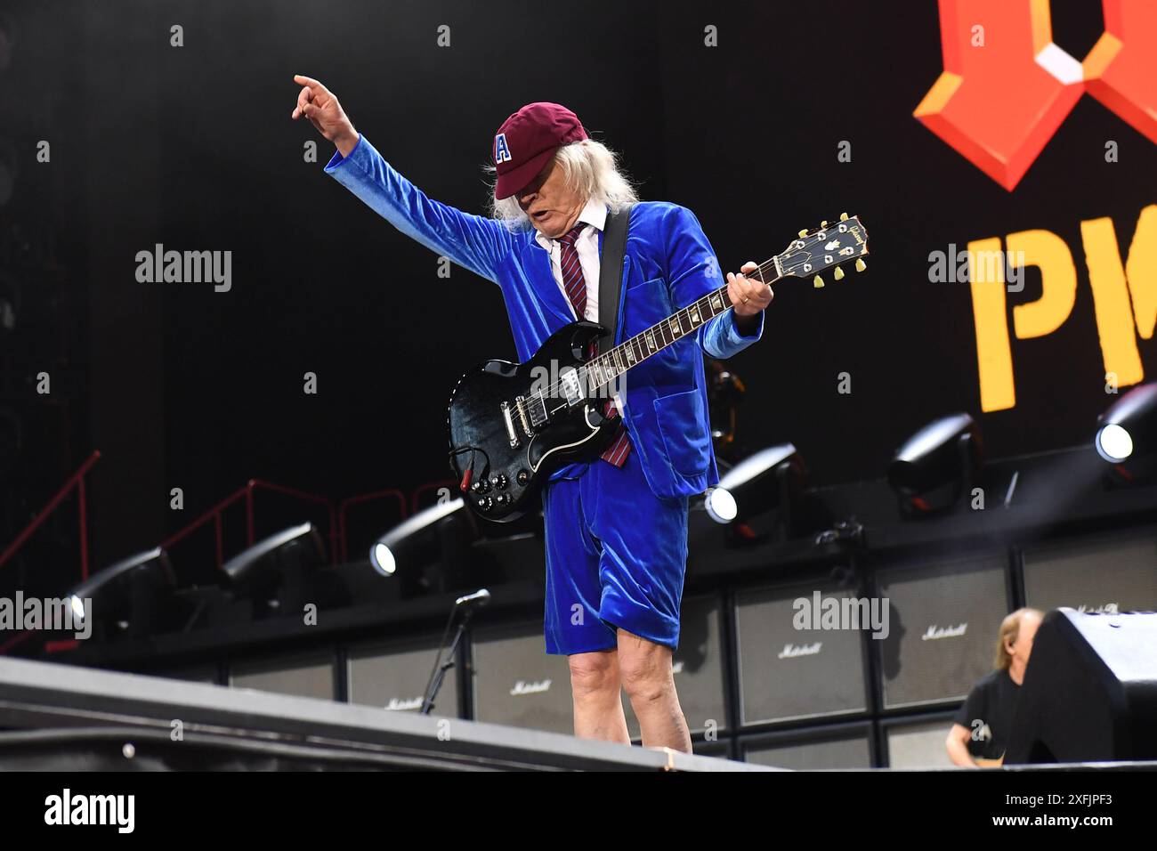 LONDON, ENGLAND - JULY 03: Angus Young of ‘AC/DC’ performing at Wembley ...