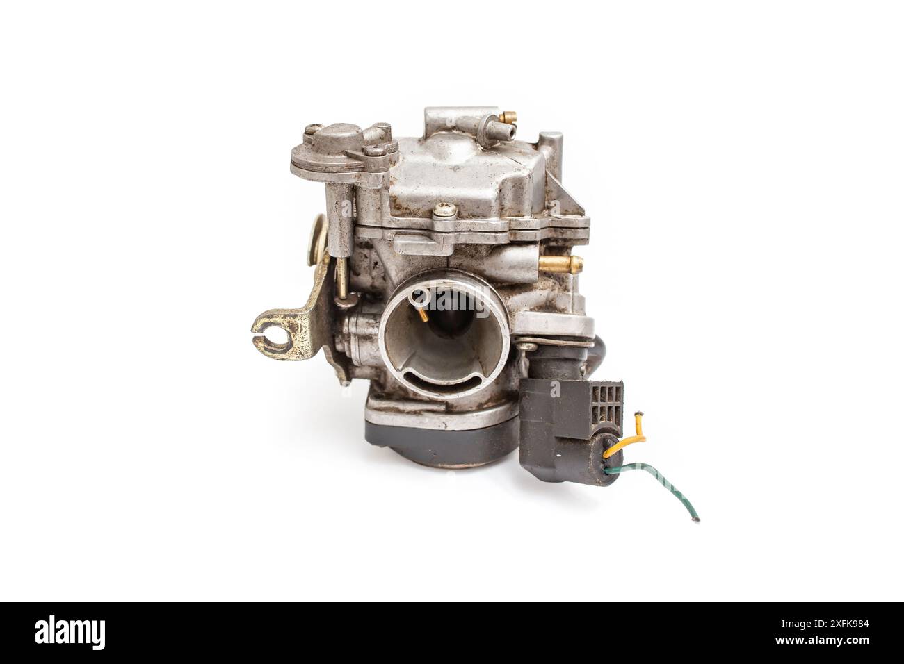 Motorcycle dirty carburetor isolated on white background, spare parts
