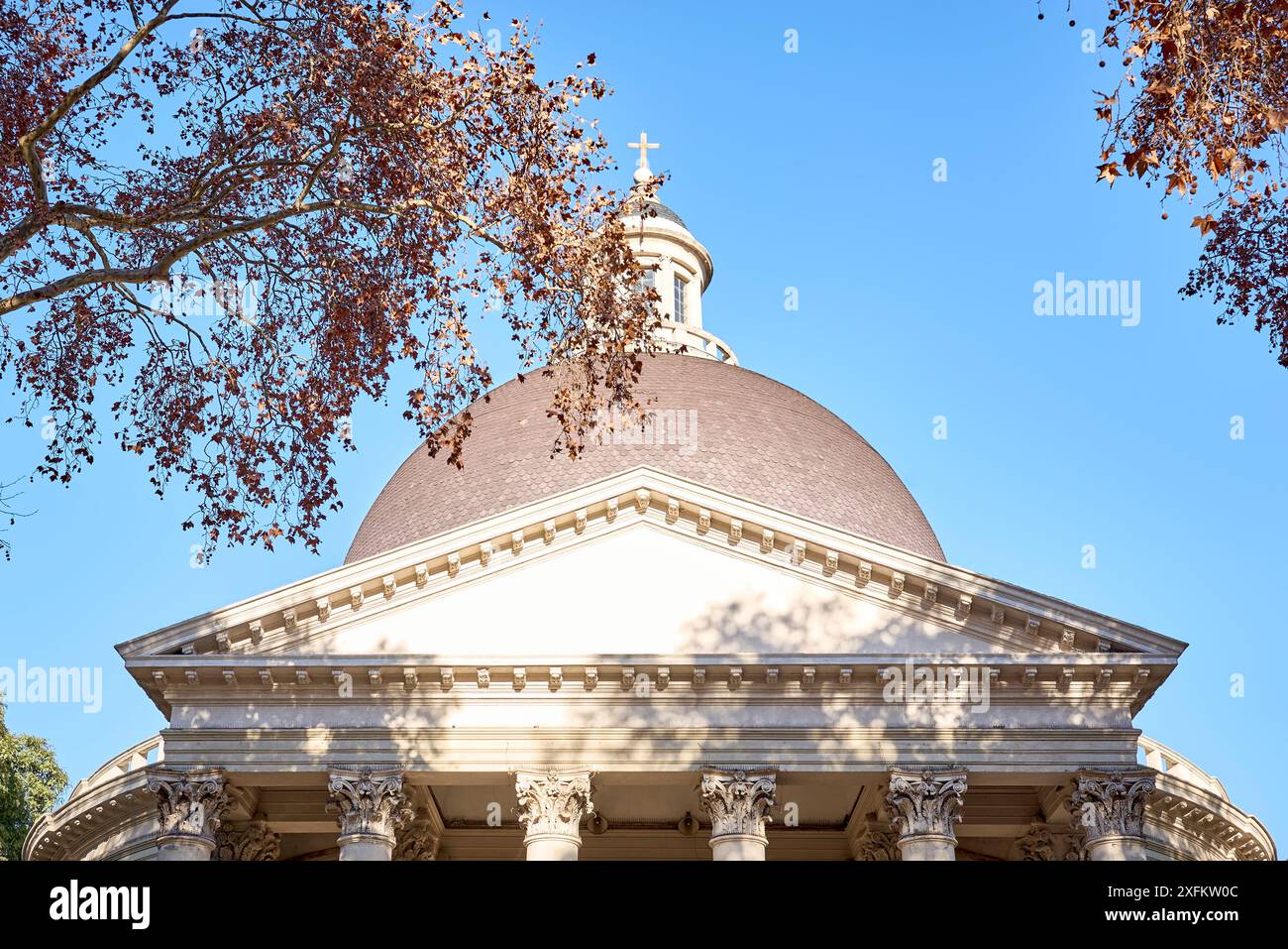 Close-up view of frontis piece and columns of a Christian church in classical Greek style with Corinthian capitals and a lantern with large windows, c Stock Photo