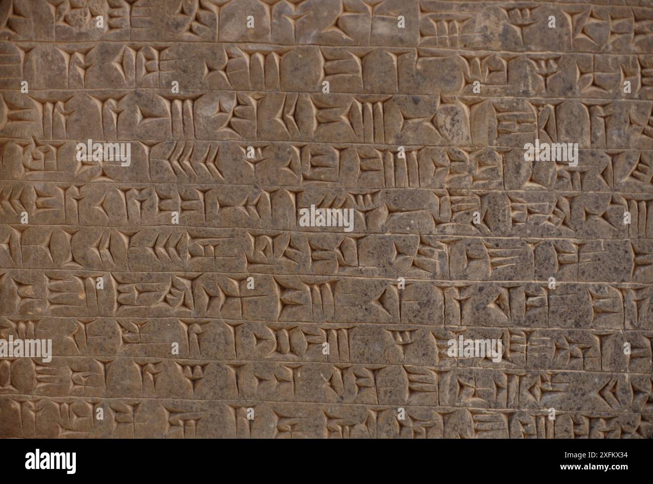 Ancient Assyrian cuneiform script in the library of the king's place at Nimrud, northern Iraq. Iraq. In 2014 Hatra was taken over by Islamic State militants and much of the site was destroyed in 2015. Taken in 1980. Stock Photo