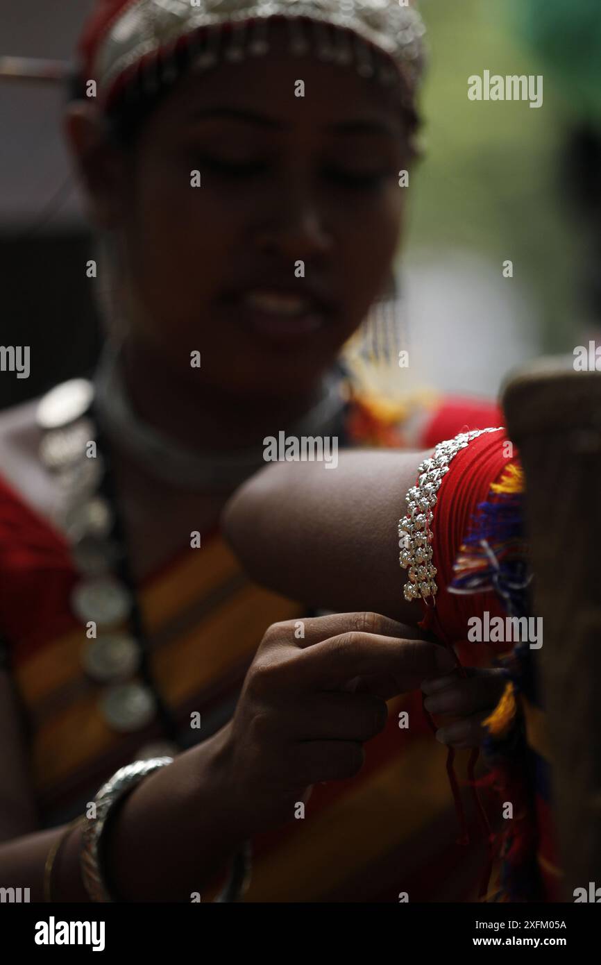 Indigenous people attend rally and cultural program organized by Bangladesh Indigenous People Forum at Dhaka Central Shaheed Minar to mark World Indig Stock Photo