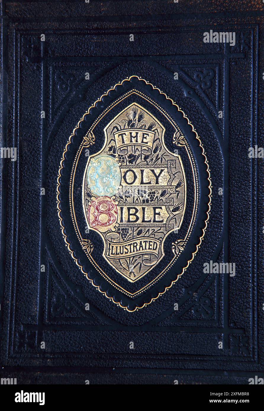 Leather-Bound Front Cover of Antique 19th Century The Holy Bible Illustrated  - The Self-Explanatory Family Bible Stock Photo