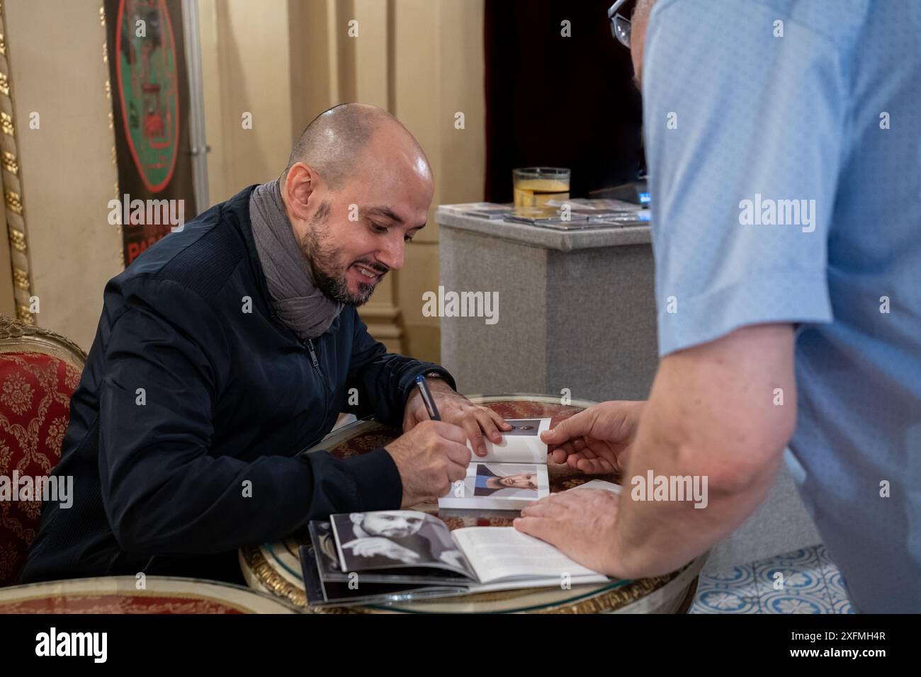 Cuntertenor singer Franco Fagioli signs his CDs after Anime Immortali - concert of Mozart arias in Słowacki Theatre in Cracow Stock Photo