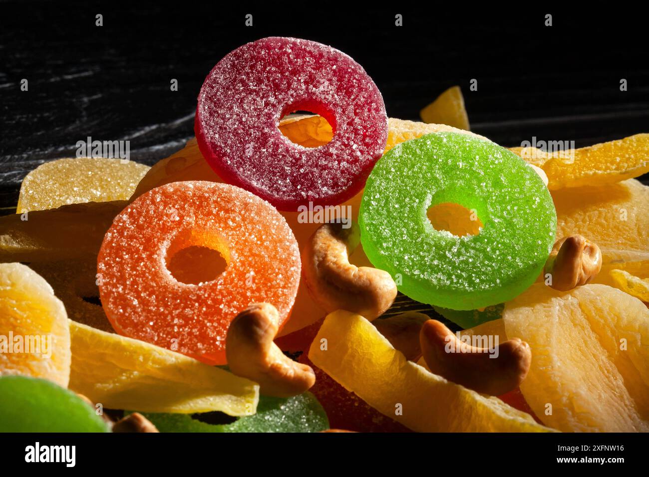 jelly candy on black wood background Stock Photo