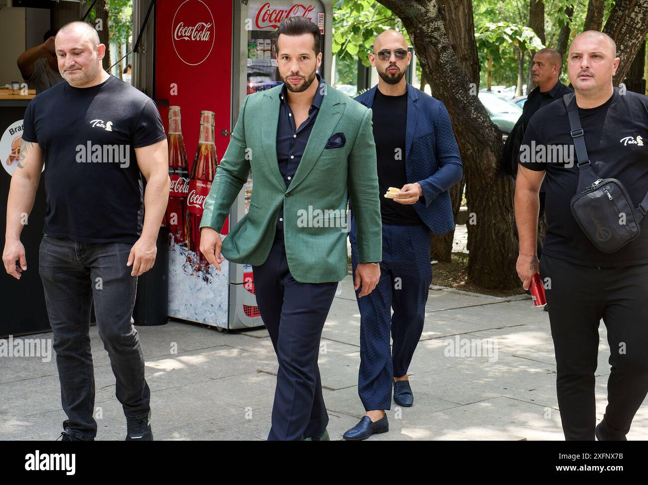 Bucharest, Romania. 4th July, 2024: Andrew Tate (C-R) and his brother