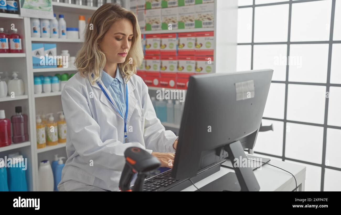 Focused blonde woman works hi-res stock photography and images - Alamy