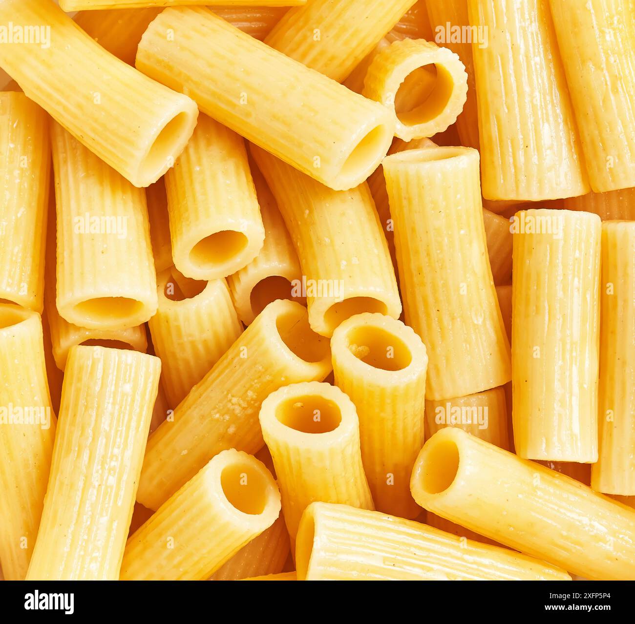 Close-up texture of uncooked italian rigatoni pasta depicting food ...