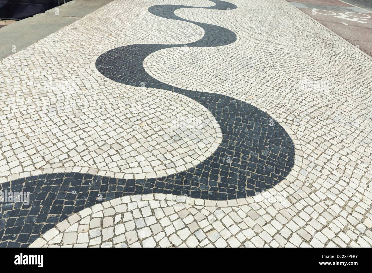 Traditional wave shaped pavement in Portugal Stock Photo - Alamy