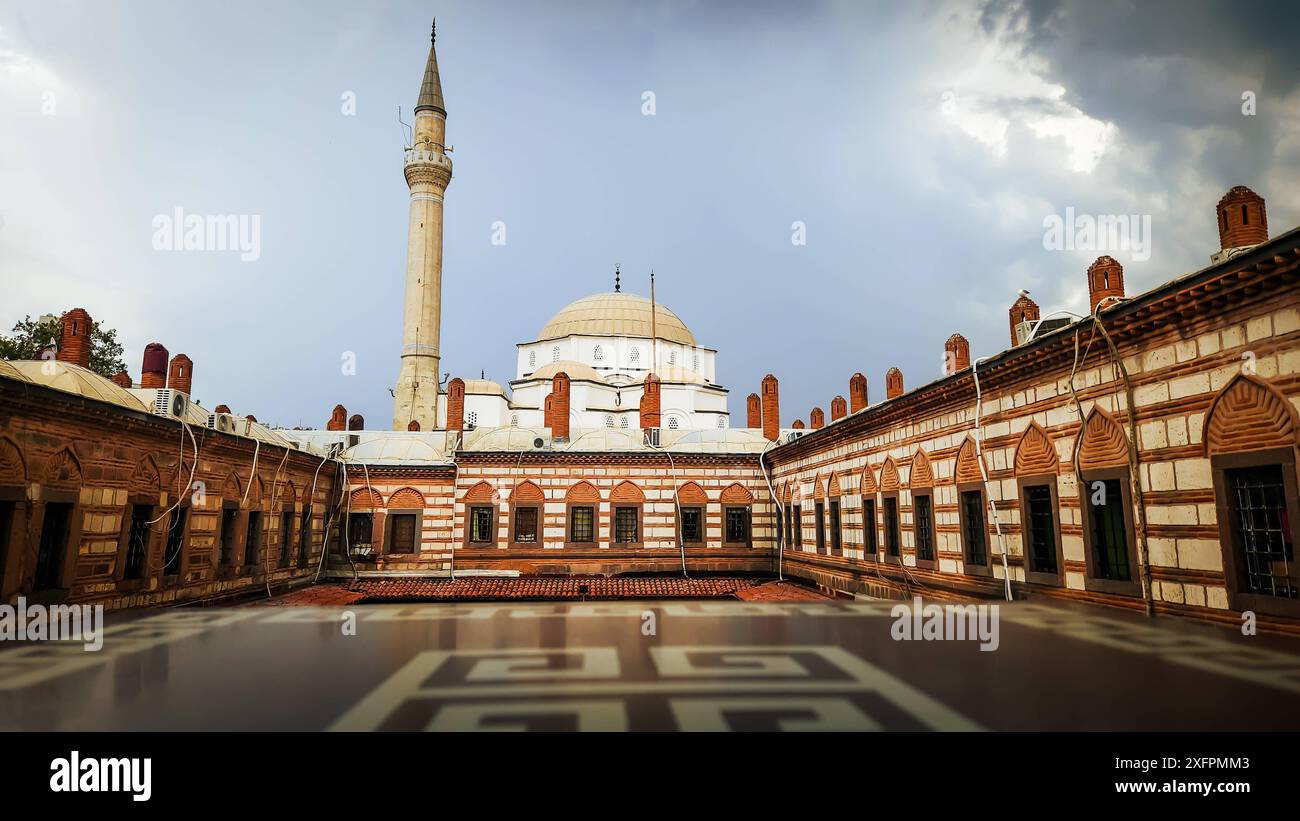 View of a historical Hisar mosque View of a historical Hisar mosque from the second floor of KÄzlaragasÄ Inn, which reflects Turkish and Ottoman culture, that is a strong touristic area of Izmir. Izmir Konak Turkey Turkey Copyright: xIdilxToffolox 20240704 154359 Stock Photo