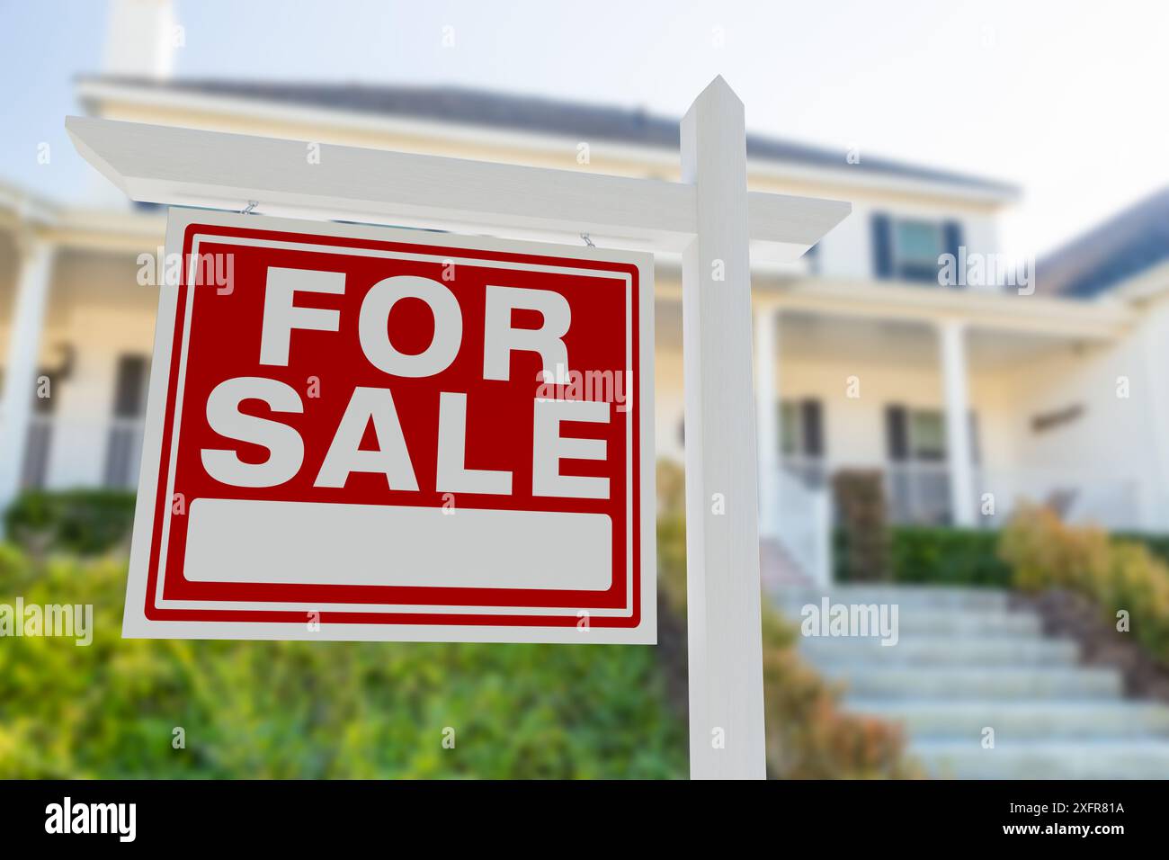 For Sale Real Estate Sign in Front of Beautiful House Stock Photo - Alamy