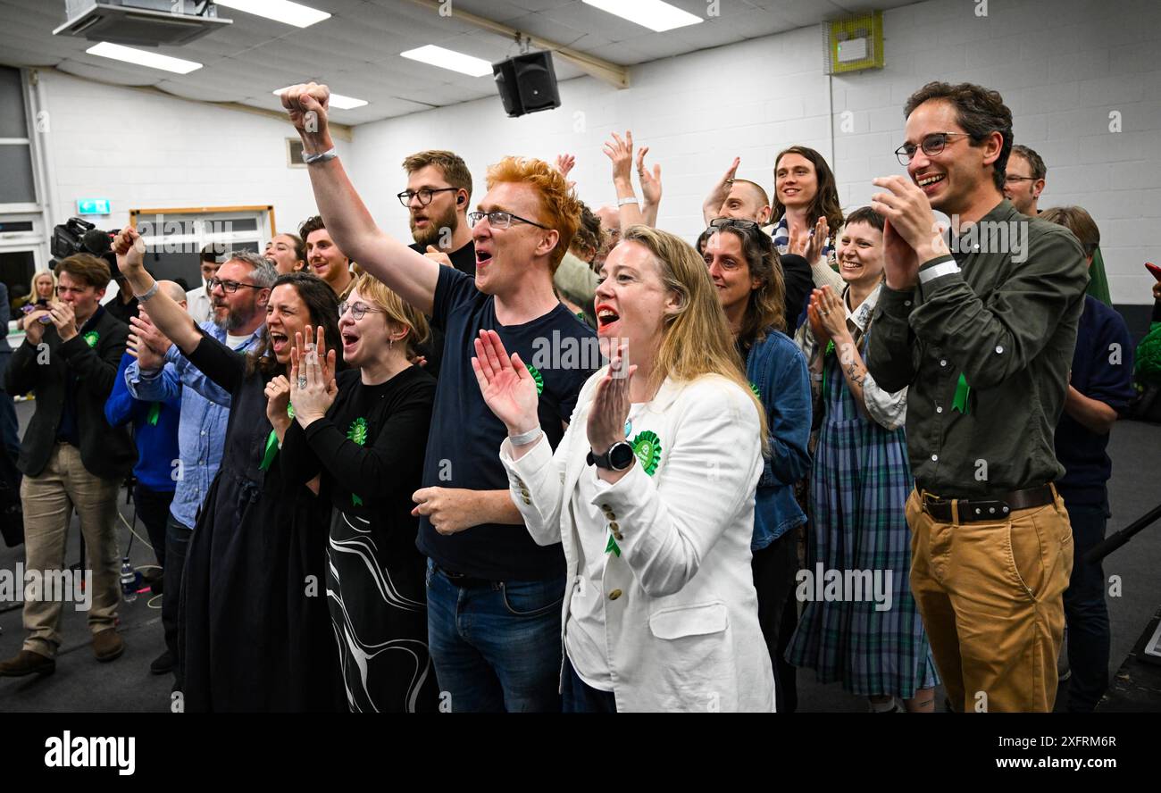Brighton UK 5th July 2024 - Members of the Green Party celebrate as ...