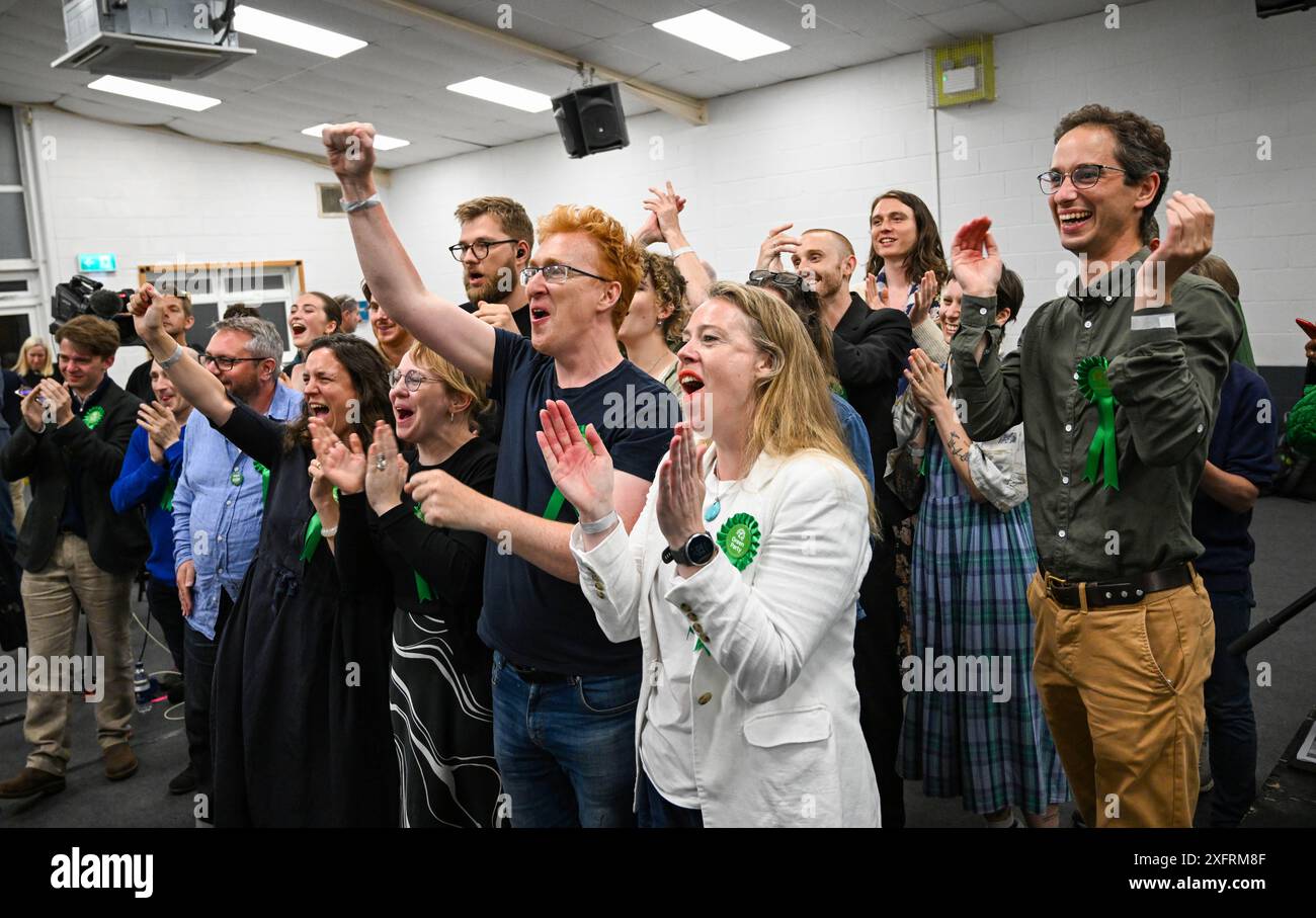 Brighton UK 5th July 2024 - Members of the Green Party celebrate as ...