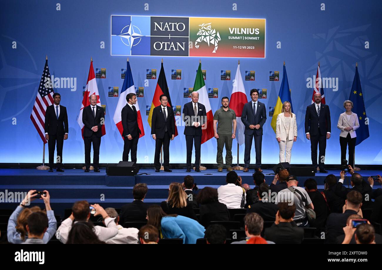 File photo dated 12/07/23 of (left to right) Prime Minister Rishi Sunak, German Chancellor Olaf Scholz, French President Emmanuel Macron, Japan's Prime Minster Fumio Kishida, US President Joe Biden, Ukrainian President Volodymyr Zelensky, Canada's Prime Minister Justin Trudeau, Italy's Prime Minister Giorgia Meloni, European Council President Charles Michel and European Commission President Ursula von der Leyen at an event to announce a Joint Declaration of Support for Ukraine during the NATO Summit in Vilnius, Lithuania. Sunak's Conservate party have suffered defeat to the Labour Party in the Stock Photo