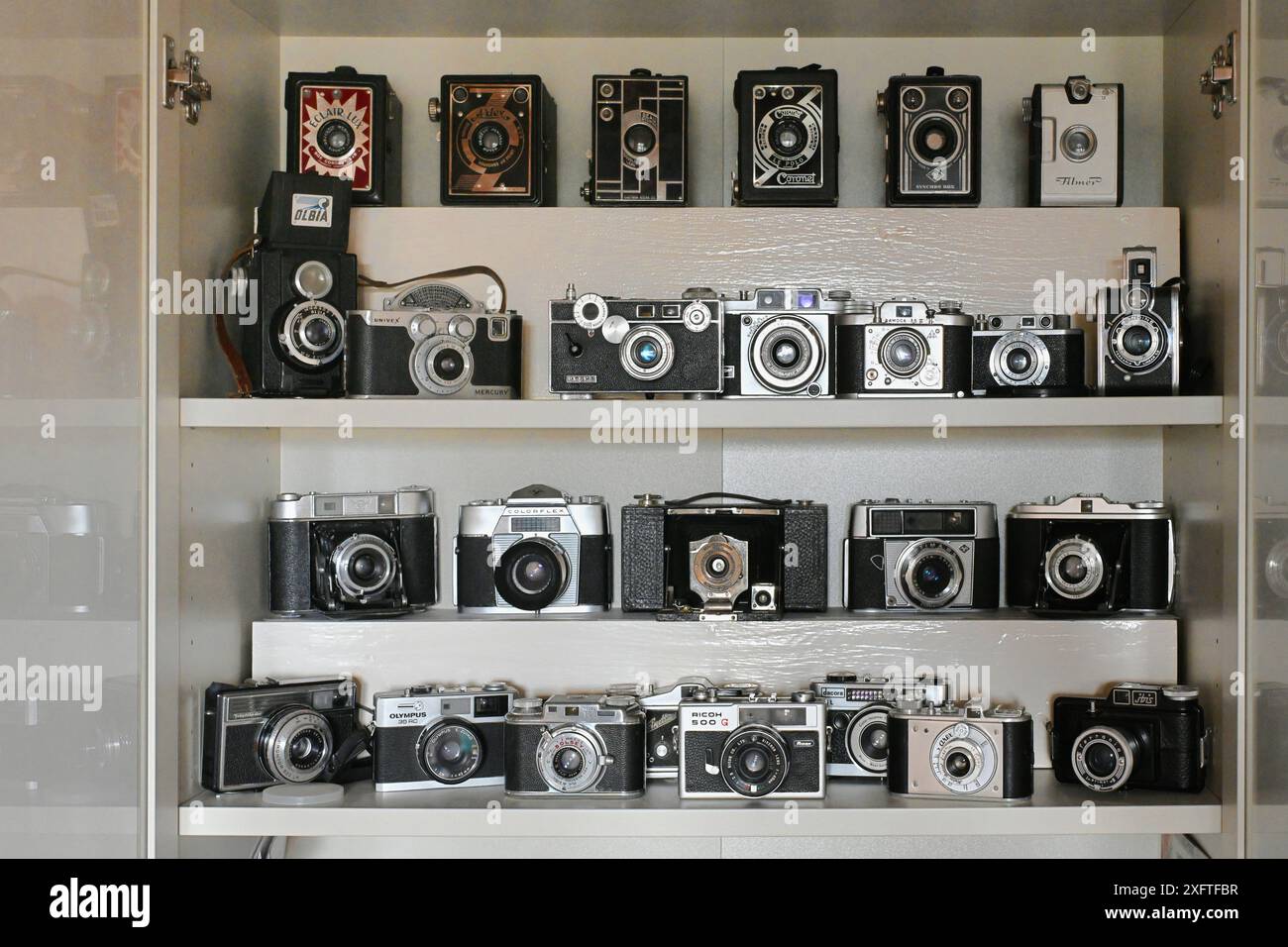 Display or Collection of Vintage Film Cameras including Box Cameras and Rangefinder Cameras Stock Photo