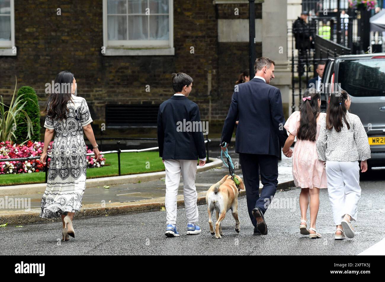 London, UK. 05th July, 2024. Downing Street London 5th July 2024. Jeremy Hunt with wife Lucia and children Jack 13, Anna 11 and Eleanor 9 along with dog Poppy leave No 11 Downing street after the Labour Party won the General Election Credit: MARTIN DALTON/Alamy Live News Stock Photo