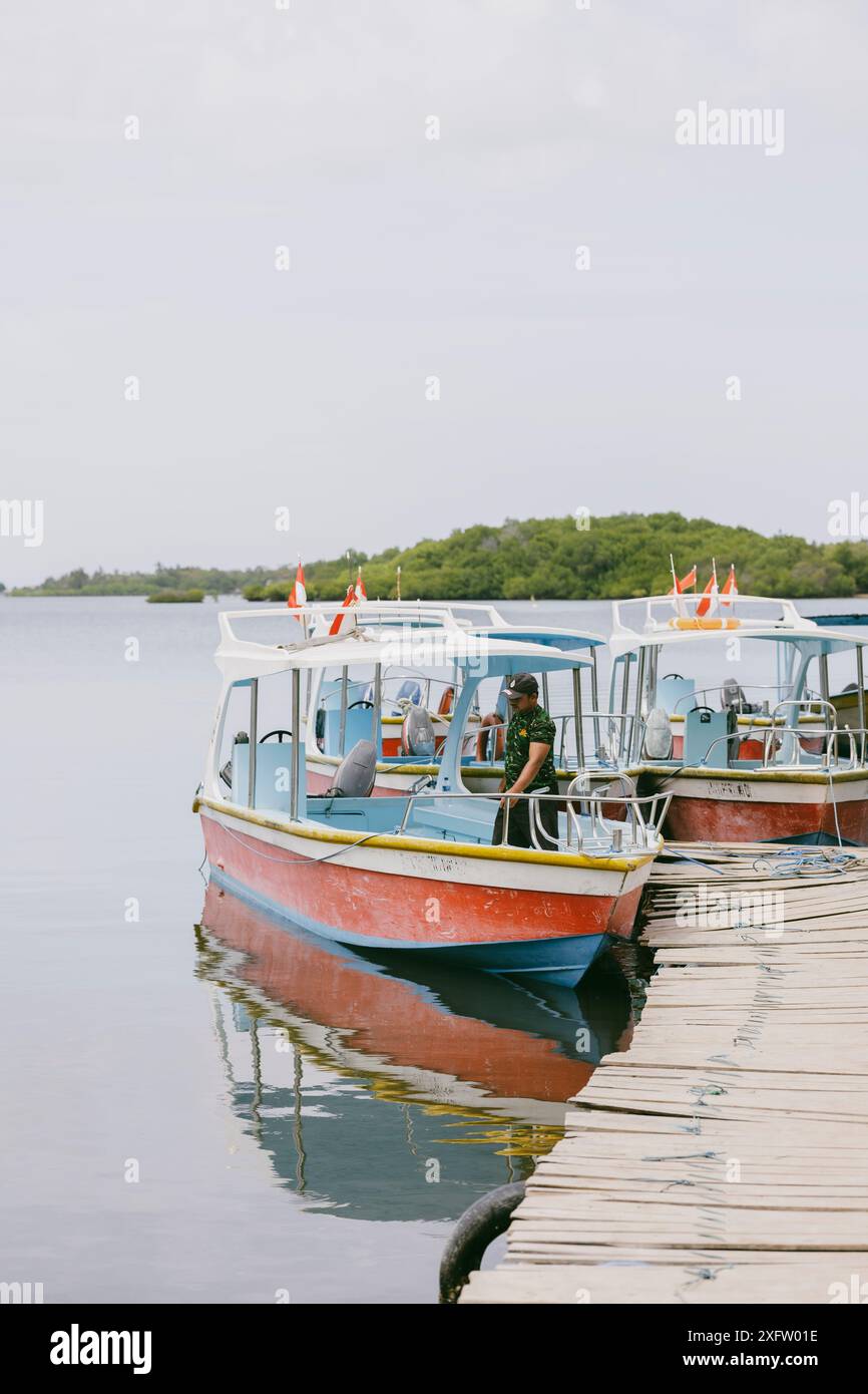 Two boats small dock in hi-res stock photography and images - Alamy