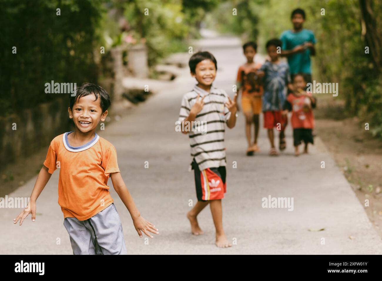 Group of boys playing and posing for camera Stock Photo - Alamy