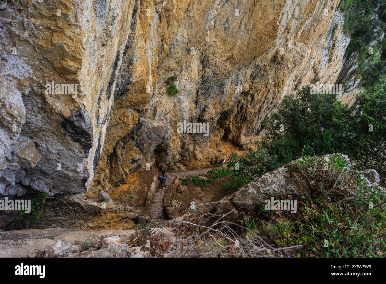 ascent of the stairs of Del Caballo lighthouse, Buciero mountain, Santoña, Cantabria, Spain. Stock Photo