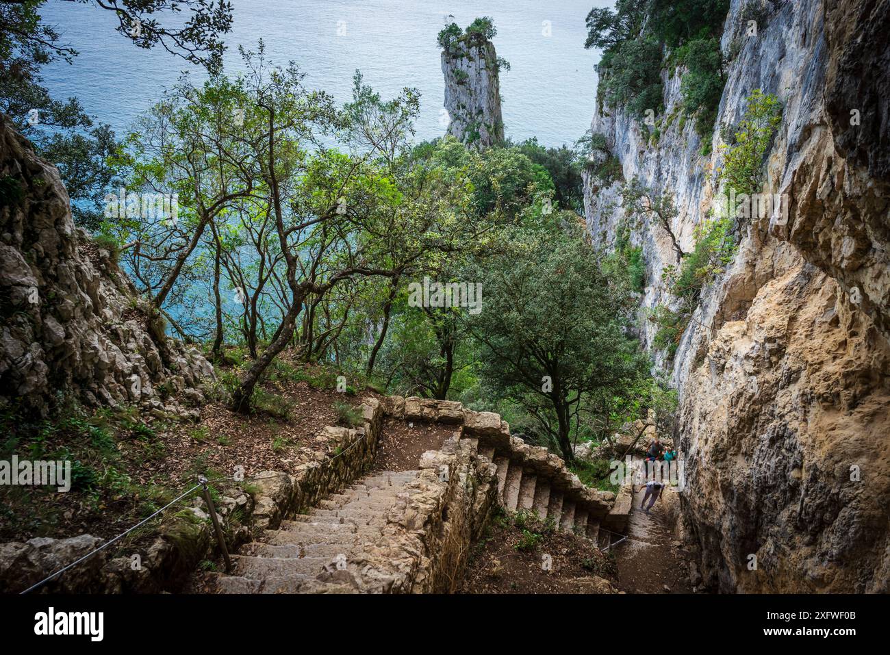 ascent of the stairs of Del Caballo lighthouse, Buciero mountain, Santoña, Cantabria, Spain. Stock Photo