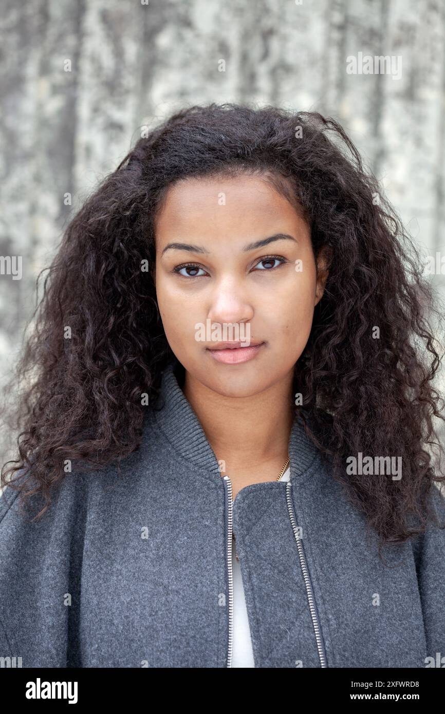 Confident woman curly hair in hi-res stock photography and images - Alamy