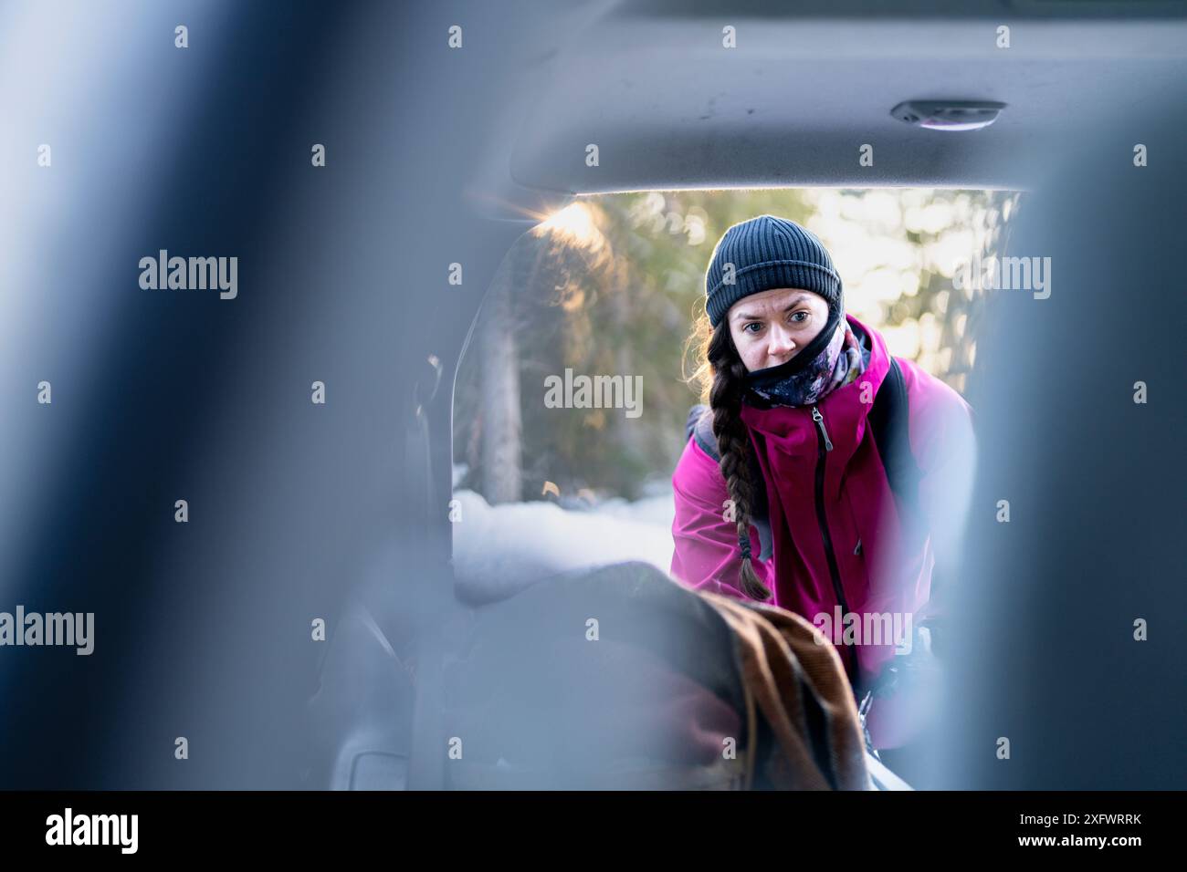 Mid adult woman looking away in winter Stock Photo