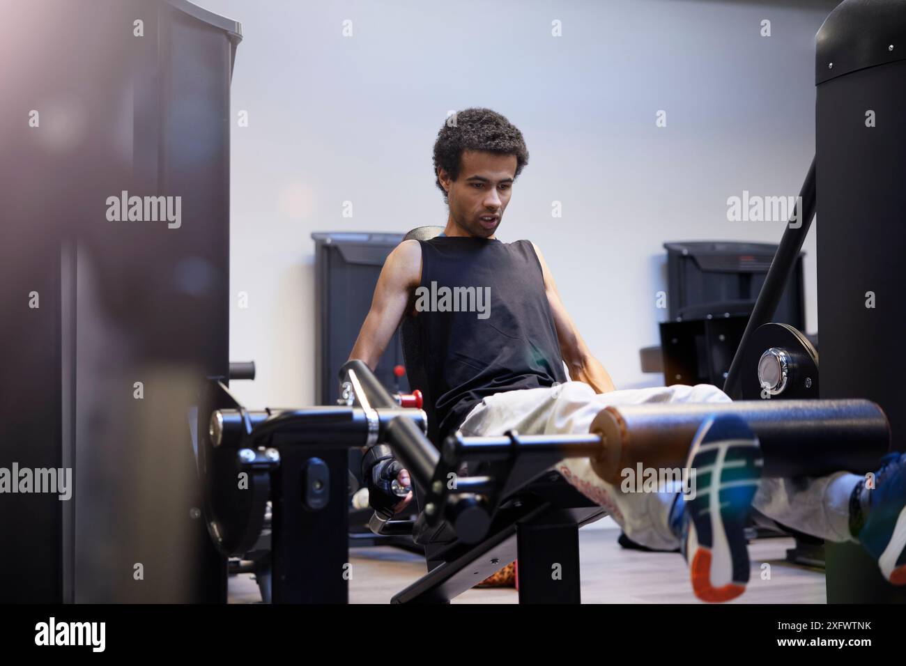 Disabled person on training machine hi-res stock photography and images ...