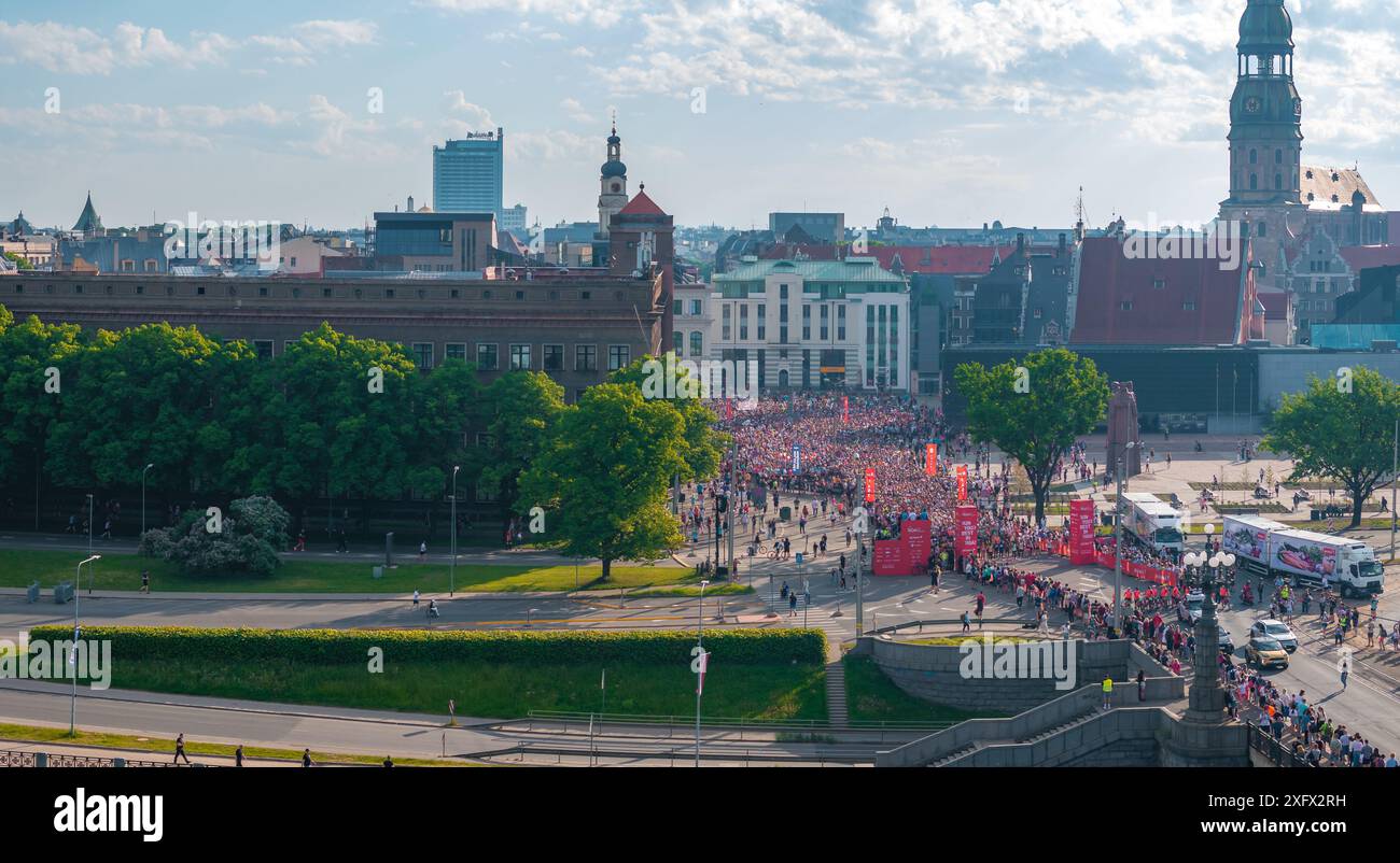 Aerial View of Runners in Riga Rimi Marathon with Dome Cathedral in ...