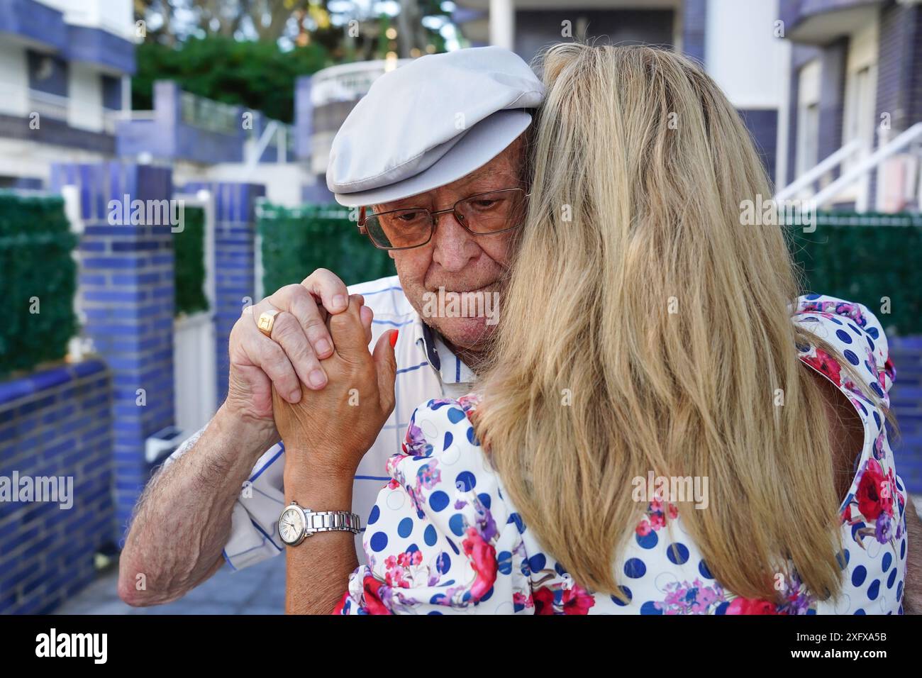 A father and his daughter dancing outdoors. Family care Stock Photo - Alamy