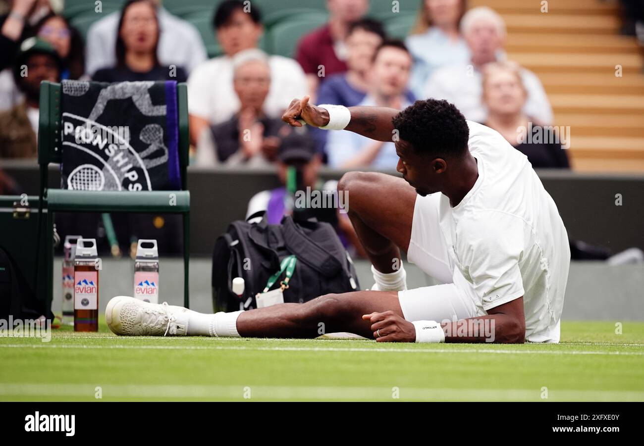 Gael Monfils takes a tumble during his match against Grigor Dimitrov