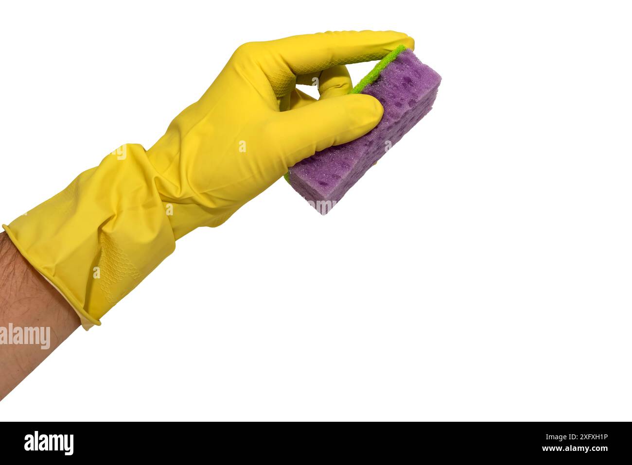 A hand in yellow rubber gloves holds a sponge on a white background ...