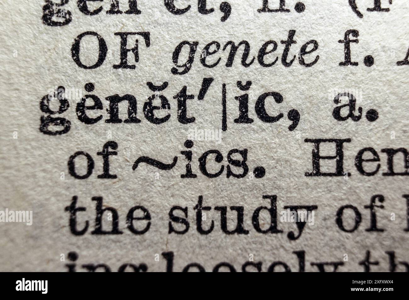 Word genetic on dictionary page, macro close-up Stock Photo