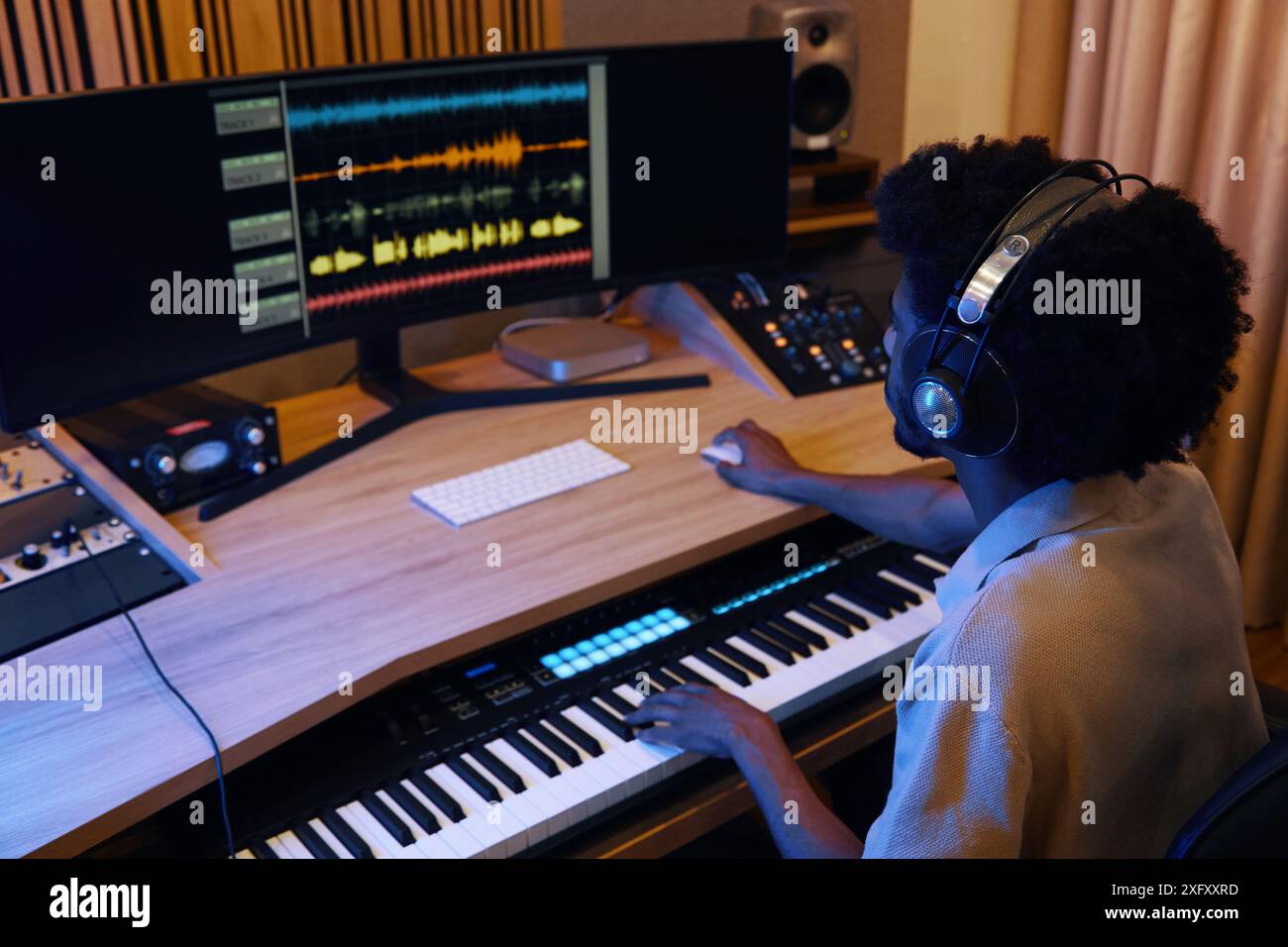 Man Working At Mixing Console Stock Photo
