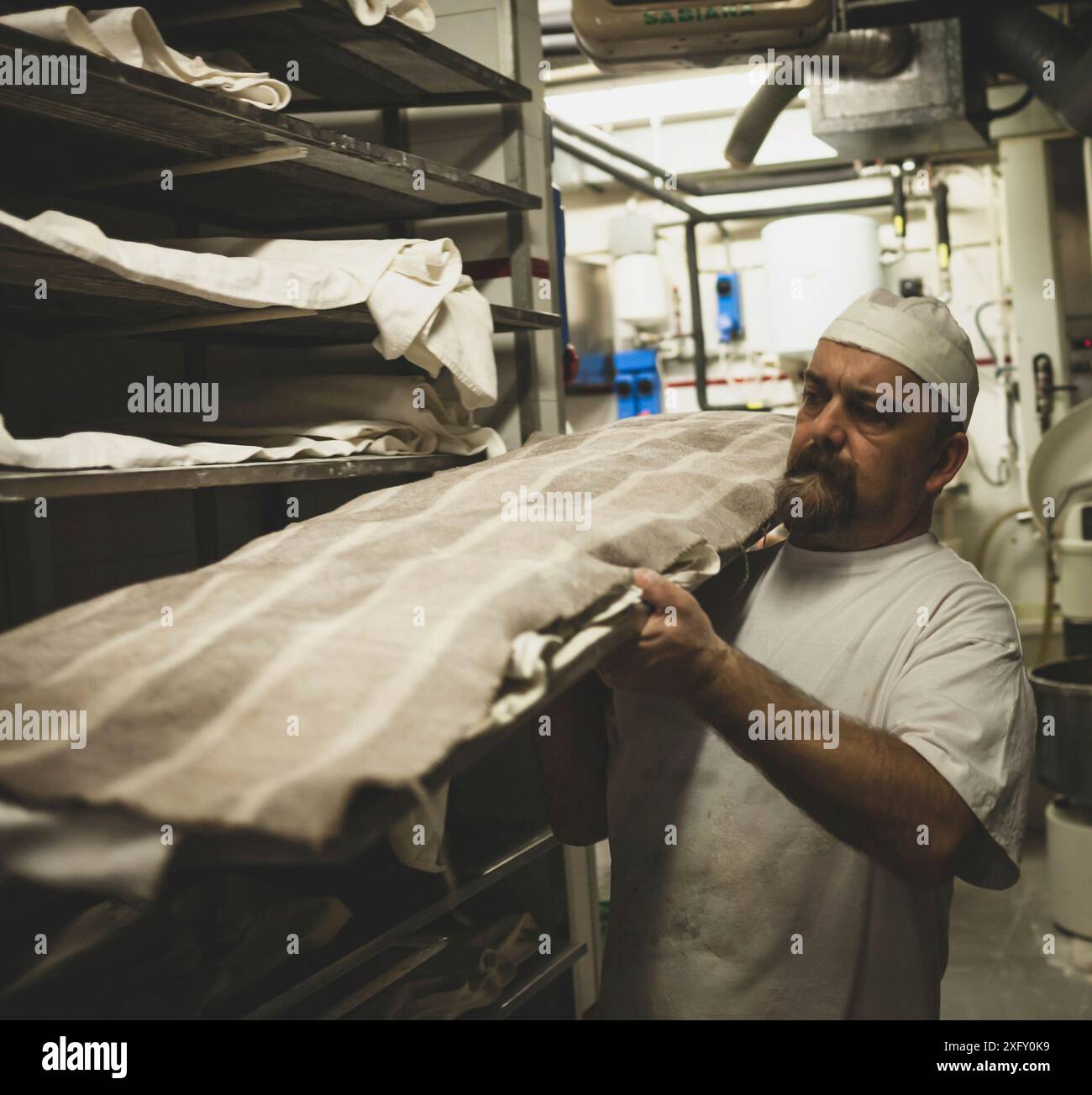 Daily production of bread baked with wood oven with traditional method ...