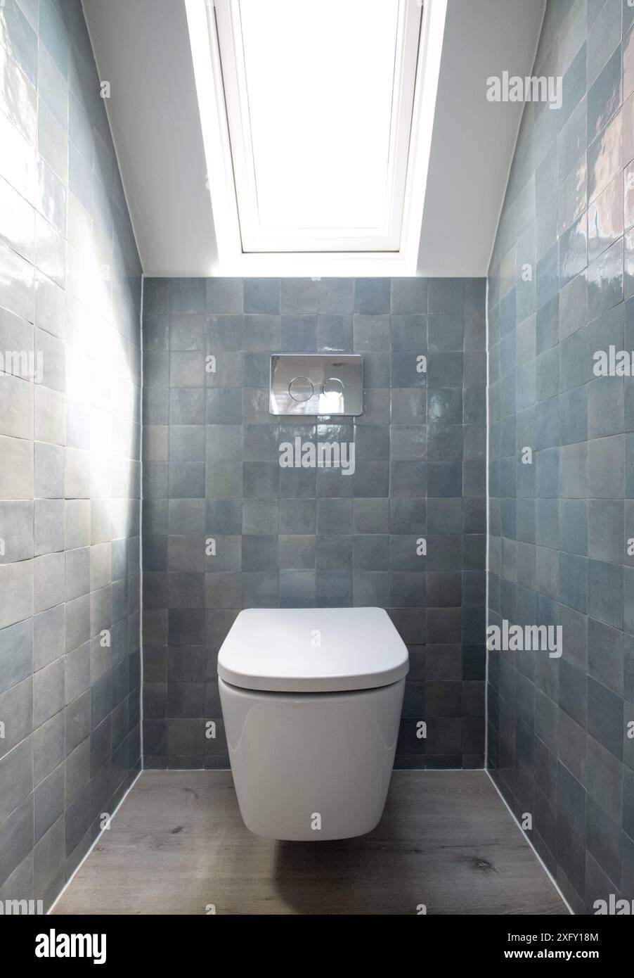 Small toilet in loft conversion making clever use of eaves in the attic ...