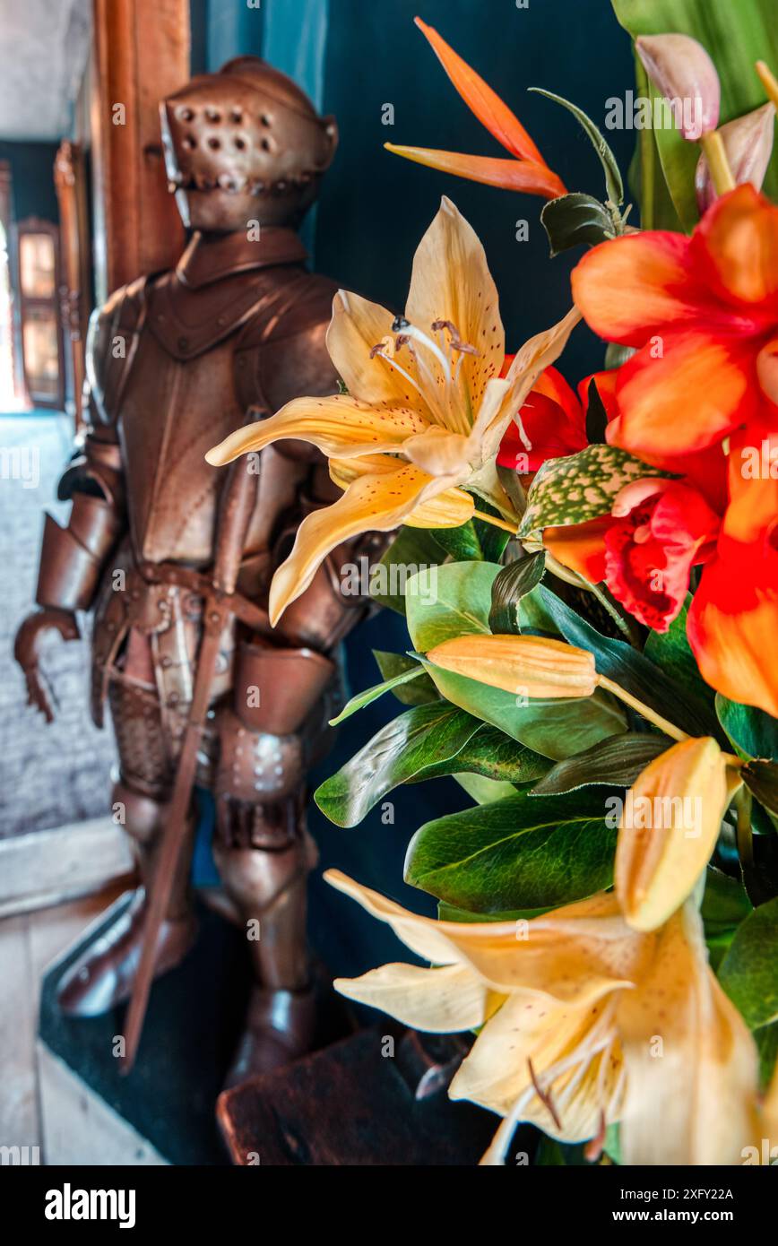 War and peace. A bunch of lilies and an old