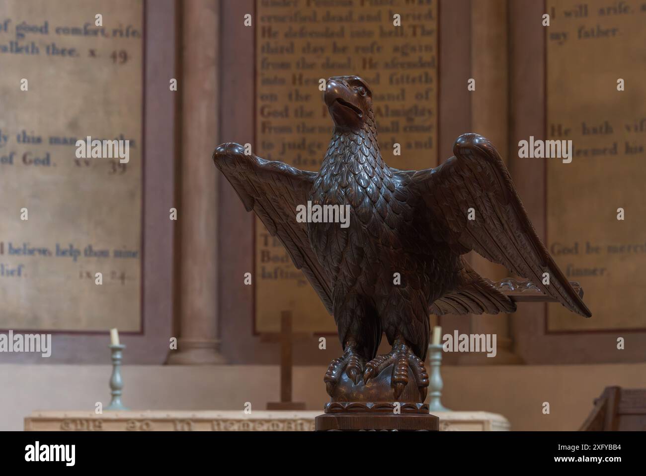 wooden Bald Eagle lectern in chapel at Killerton House, Devon, UK Stock Photo