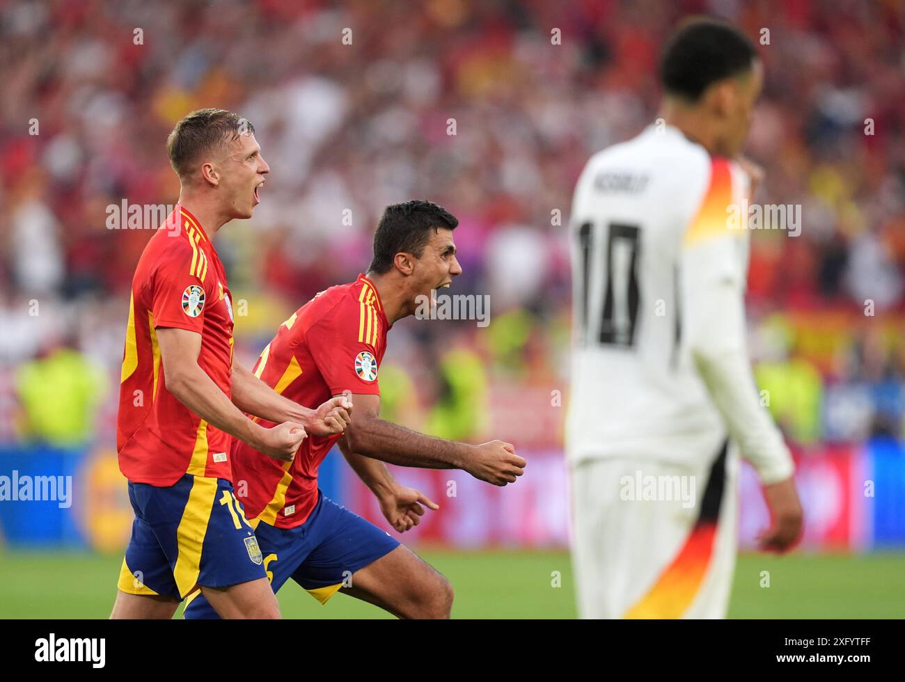 Spain's Dani Olmo (left) and Rodri celebrate after the UEFA Euro 2024
